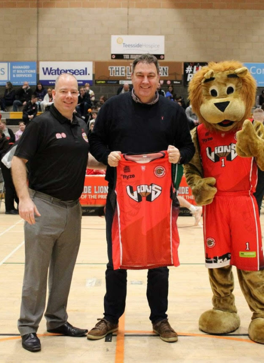 Cleveland Police Crime Commissioner Steve Turner is presented with a jersey from Lions owner James Thomson Sam Dunk